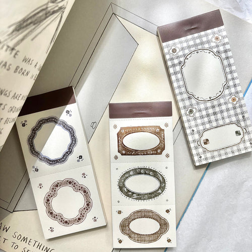 Decorative memo pad with intricate designs on a textured surface