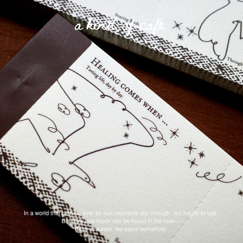 a kind of cafe Perforated Memo Pad | Birds in Paris